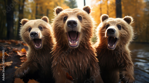 Group of Happy bears pubs in nature looking into camera