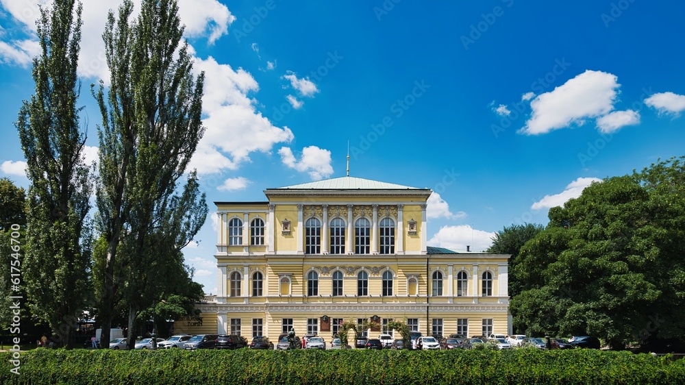 Obraz premium Zofin Palace on Slovansky Island Under a Blue Summer Sky in Prague, Czech Republic