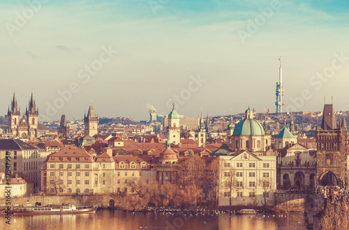 Old town of Prague, Czech Republic over river Vltava with cathedral and Charles bridge on skyline. Bright sunny day with blue sky. Praha panorama landscape view. © Designpics