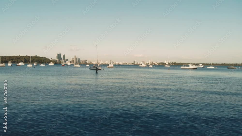 Yacht mooring timelapse. Pier under the setting sun yachts in the background.Nautical vessel, transportation, amateur sailing, vacations, cruising, recreation concepts. Yacht mooring timelapse. Pier under the setting sun yachts in the background.Nautical vessel, transportation, amateur sailing, vacations, cruising, recreation concepts.