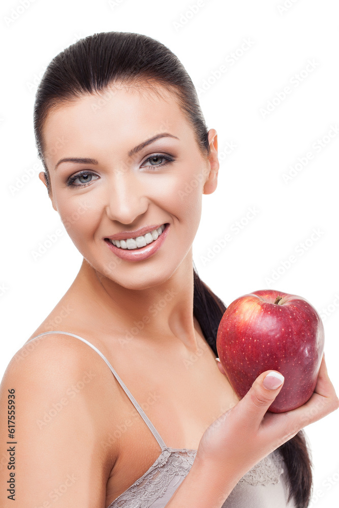 Beautiful happy young woman holding red apple. Isolated on white background. Copy space. Beautiful happy young woman holding red apple. Isolated on white background. Copy space.