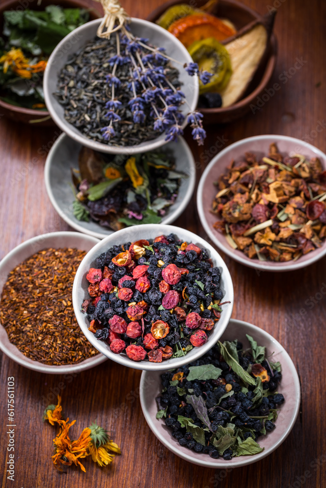 Assortment of herbal and fruit tea in bowls