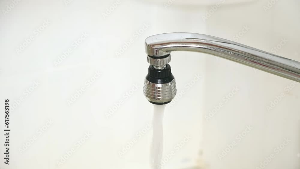 Running and dripping water. Turning off the water. Water tap , faucet. Flow water in bathroom with sink. Hygiene concept. Running and dripping water. Turning off the water. Water tap , faucet. Flow water in bathroom with sink. Hygiene concept.