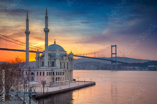 Image of Ortakoy Mosque with Bosphorus Bridge in Istanbul during beautiful sunrise.