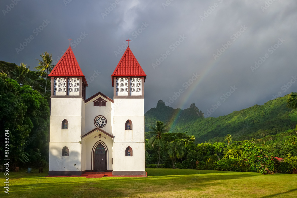 Rainbow on Haapiti church in Moorea island, landscape. French Polynesia