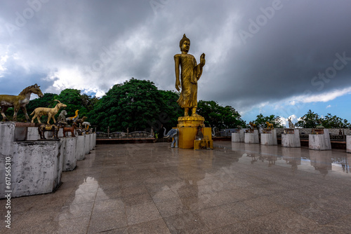 Background of religious sights on the Thai island of Koh Samui (Pra Buddha Dīpankara), located high in the mountains. There are Buddha statues and a large chapel overlooking the surrounding scenery. photo