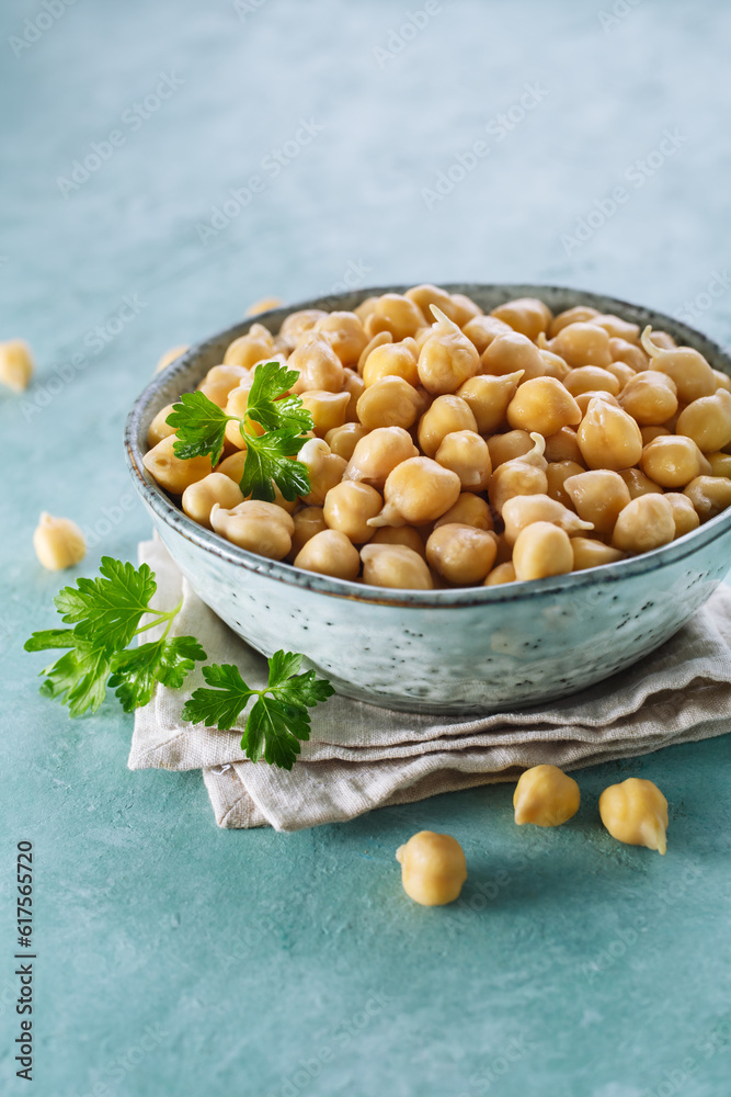 Sprouted chickpeas in the bowl. Healthy food. Selective focus Sprouted chickpeas in the bowl. Healthy food. Selective focus