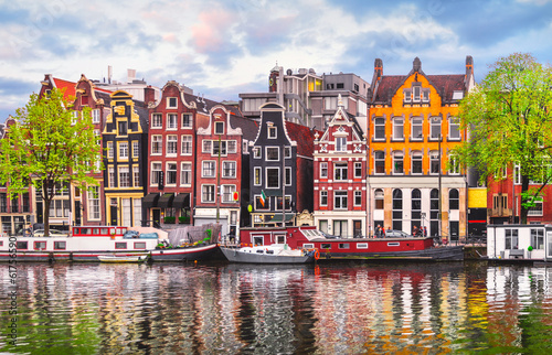 Canvas Print Amsterdam Netherlands dancing houses over river Amstel landmark in old european city spring landscape