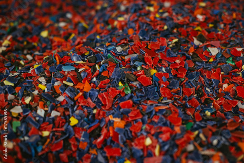 Vibrant Remnants: Assorted Plastic Scraps from Recycling Process in Extrusion Factory