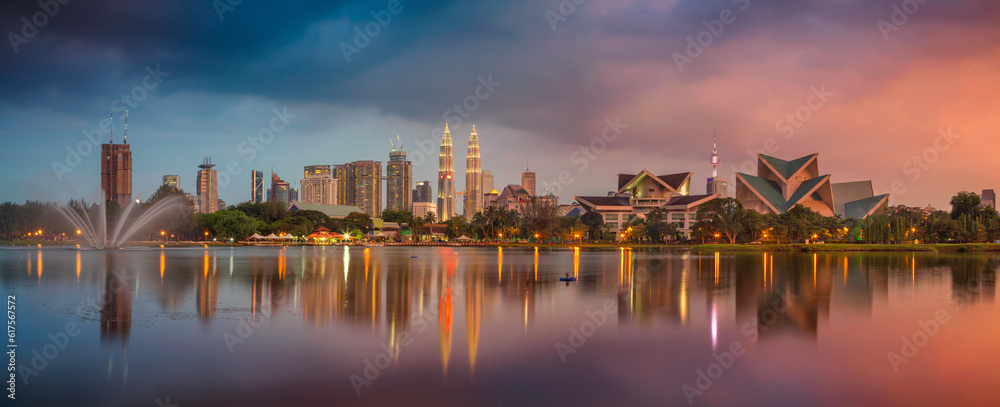 Panoramic image of Kuala Lumpur, Malaysia skyline during sunset.