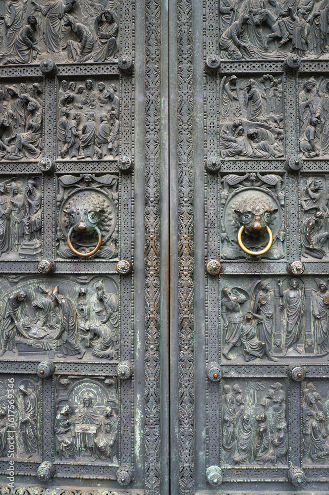 Ancient medieval metal door of Bremen Cathedral, Germany.