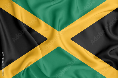 Jamaica flag waving with the wind, wide format, 3D illustration rendring. Design with satin fabric. to be used for educational purposes or for illustrations of videos or vlogs.