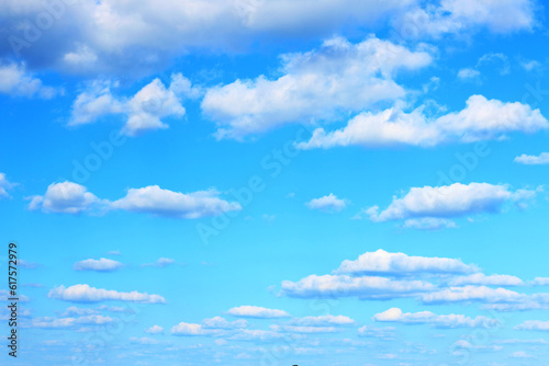 Beautiful blue gradient sky with many clouds. Nature wallpaper background