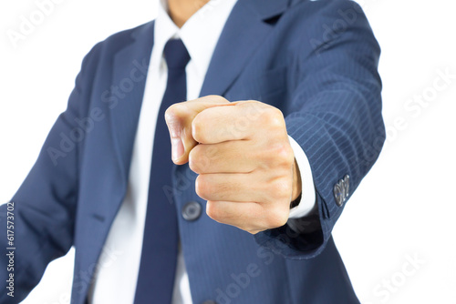 Businessman Fist in Blue Suit Isolated on White Background on Vertical View. Concept about Violence or Strike in Organization photo