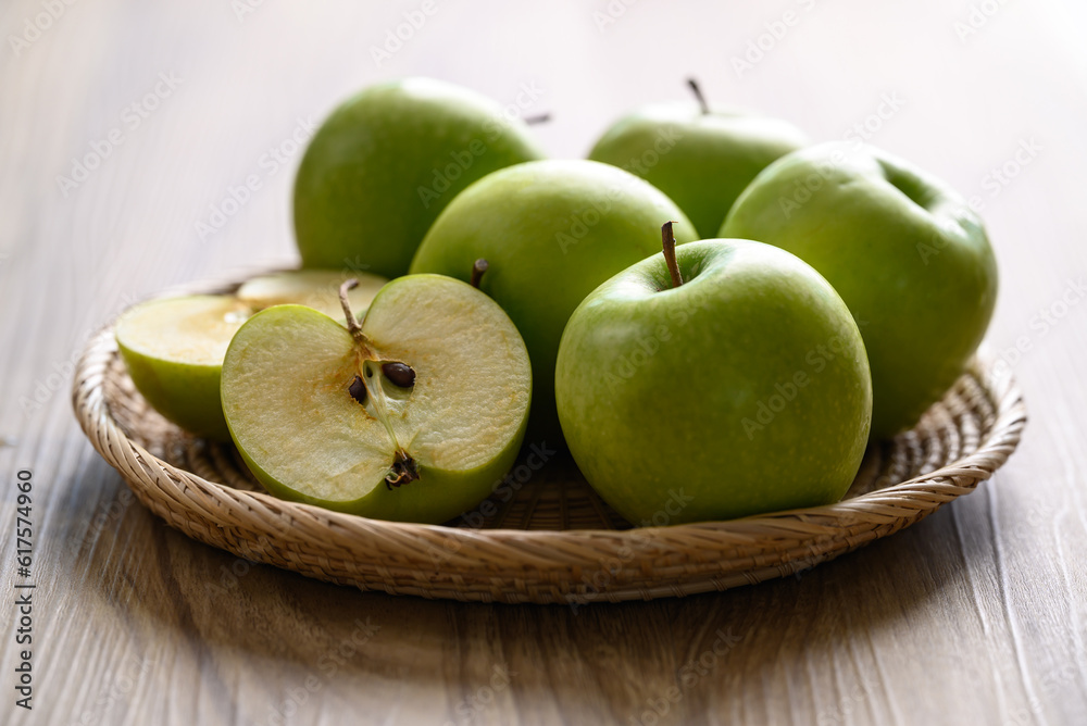 Green apple fruit in basket on wooden background, Healthy fruit Green apple fruit in basket on wooden background, Healthy fruit