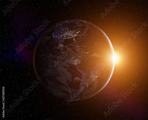 Planet Earth with rising Sun, view from space. Elements of this image furnished by NASA