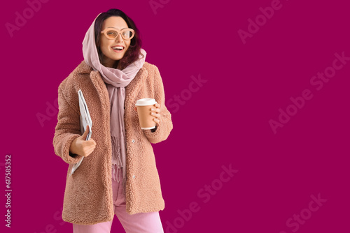 Stylish young woman in tedd...