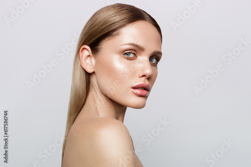 Beauty portrait of model with natural make-up. Fashion shiny highlighter on skin, sexy gloss lips make-up © Designpics