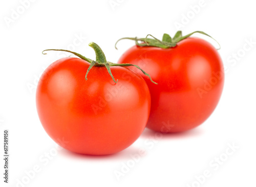 Pair of ripe red tomato isolated on white background
