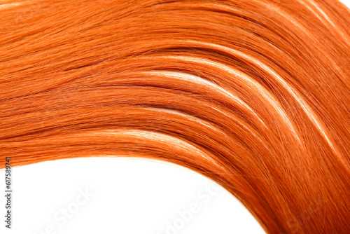 Beautiful ginger hair isolated on white background  closeup