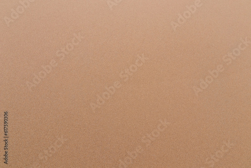 Sand texture background sandy beach top view.