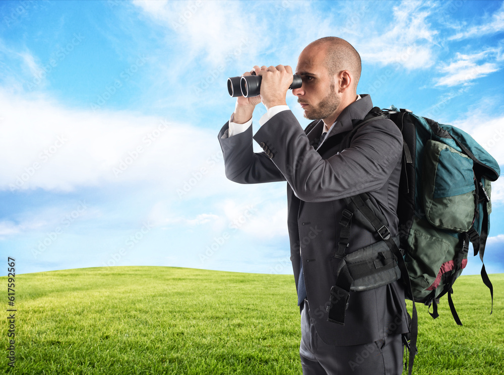 Businessman looking for new new business with binocular Businessman looking for new new business with binocular