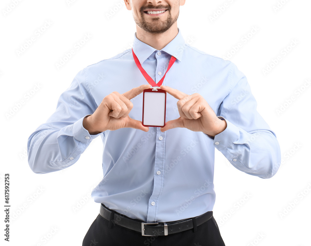 Young man with blank badge on white background, closeup Young man with blank badge on white background, closeup