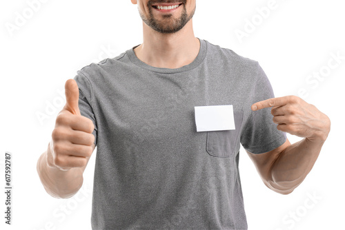 Young man with blank badge ...
