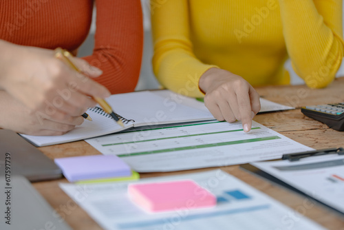 Group of creative meeting, hands of business marketing design and planning project on desk in office.