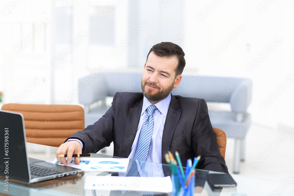 Business man using laptop and modern devices