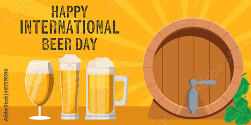 international beer day horizontal banner with three glasses of beer and a beer barrel