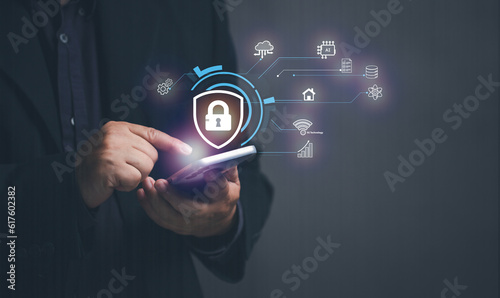 online safety concept. Businessman setting up mobile security to conduct various online transactions via mobile phone. Security encryption to prevent data theft from hackers. Cloud. Big Data.