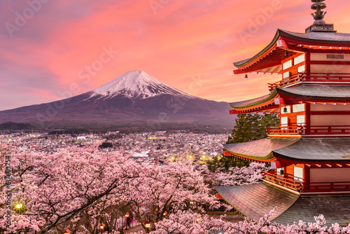 Fujiyoshida, Japan at Chureito Pagoda and Mt. Fuji in the spring with cherry blossoms. photo