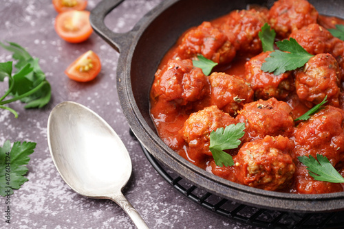 Homemade meatballs in tomat...
