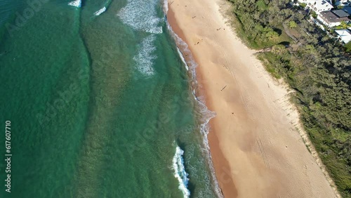 Turquoise Seascape Of Kawana Beach In Queensland, Australia - aerial drone shot photo