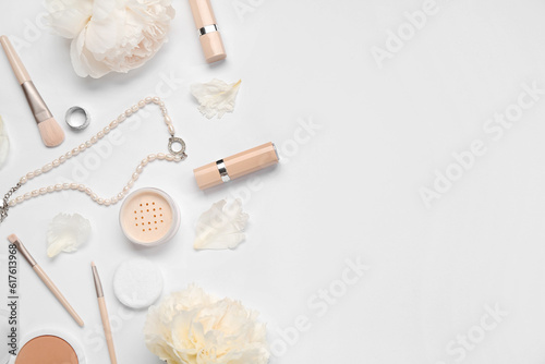 Composition with stylish female accessories, cosmetics and beautiful peony flowers on white background