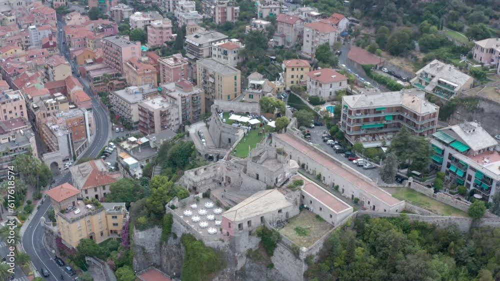 Wedding event in Italian town with tables and gazebos with view of the city Wedding event in Italian town with tables and gazebos with view of the city