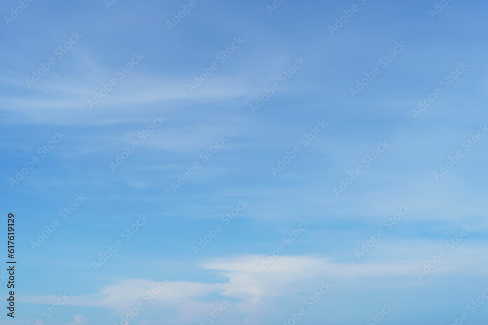 Beautiful clouds during spring time in a Sunny day. Blue sky and white fluffy clouds