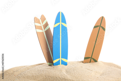 Mini surfboards on sand aga...