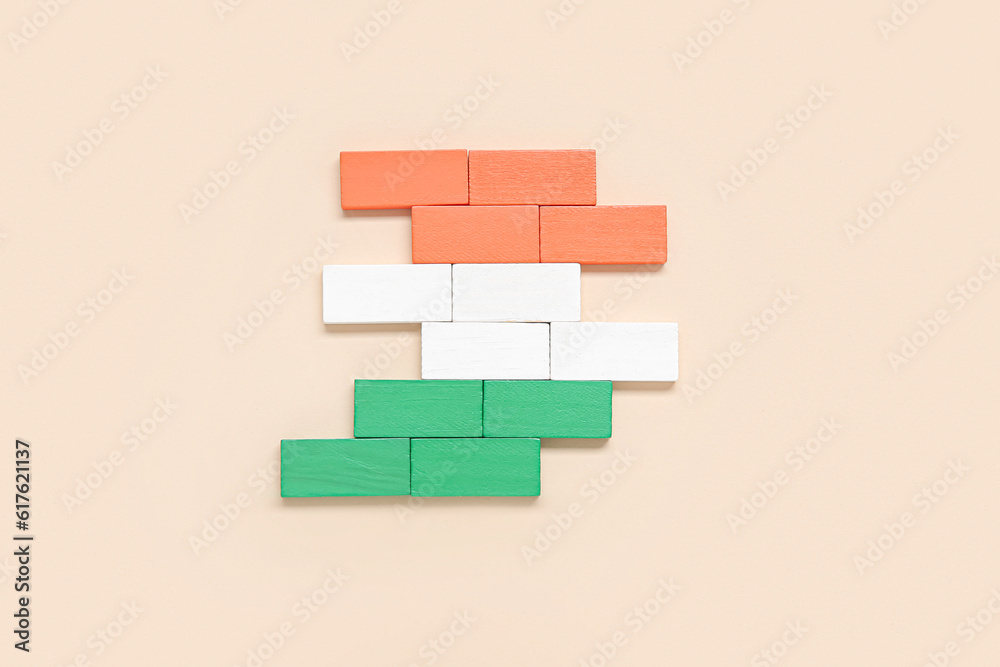 Indian flag made of blocks on pale orange background Indian flag made of blocks on pale orange background