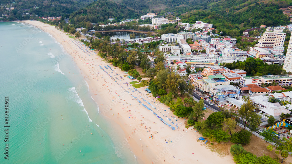 Kata Beach, Phuket Island, Thailand,  the blue sea blue sky and white sandy beach during summer time of southern Thailand. This famous beach is good for holiday vacation and sun bathing.
