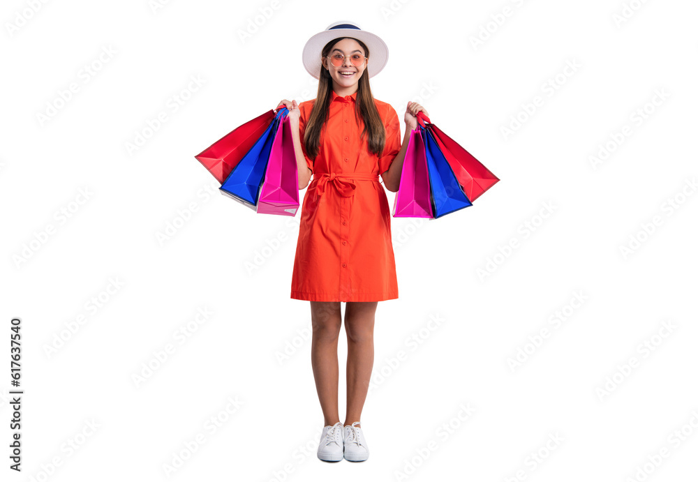 teen shopper girl with shopping bags isolated on white