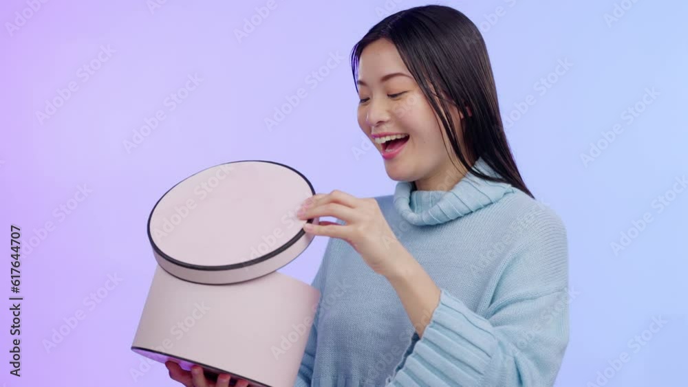 Asian woman, studio and open gift box with smile, surprise and winner with prize, birthday and happy by background. Japanese girl, student and package with wow for giveaway, present and competition Asian woman, studio and open gift box with smile, surprise and winner with prize, birthday and happy by background. Japanese girl, student and package with wow for giveaway, present and competition