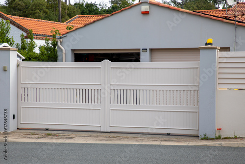 gate pvc white plastic portal and fence on modern house street