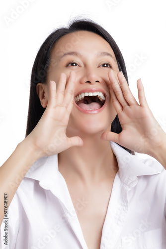 Asian American shouting for joy isolated on a white background