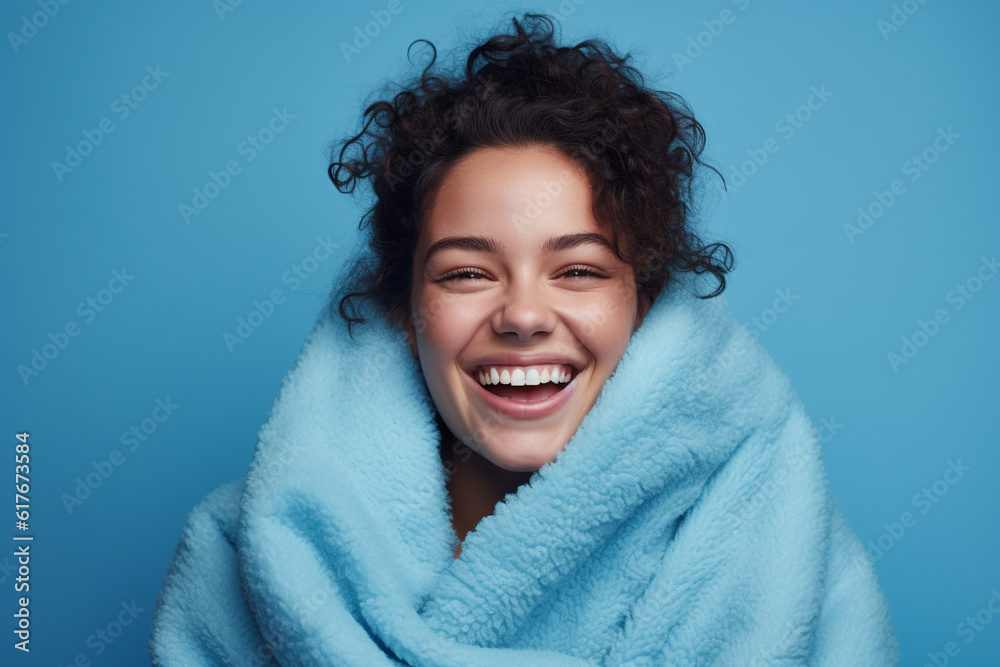 Young woman wrapped warmly in a fluffy dressing grown against the winter cold, headshot, isolated Young woman wrapped warmly in a fluffy dressing grown against the winter cold, headshot, isolated