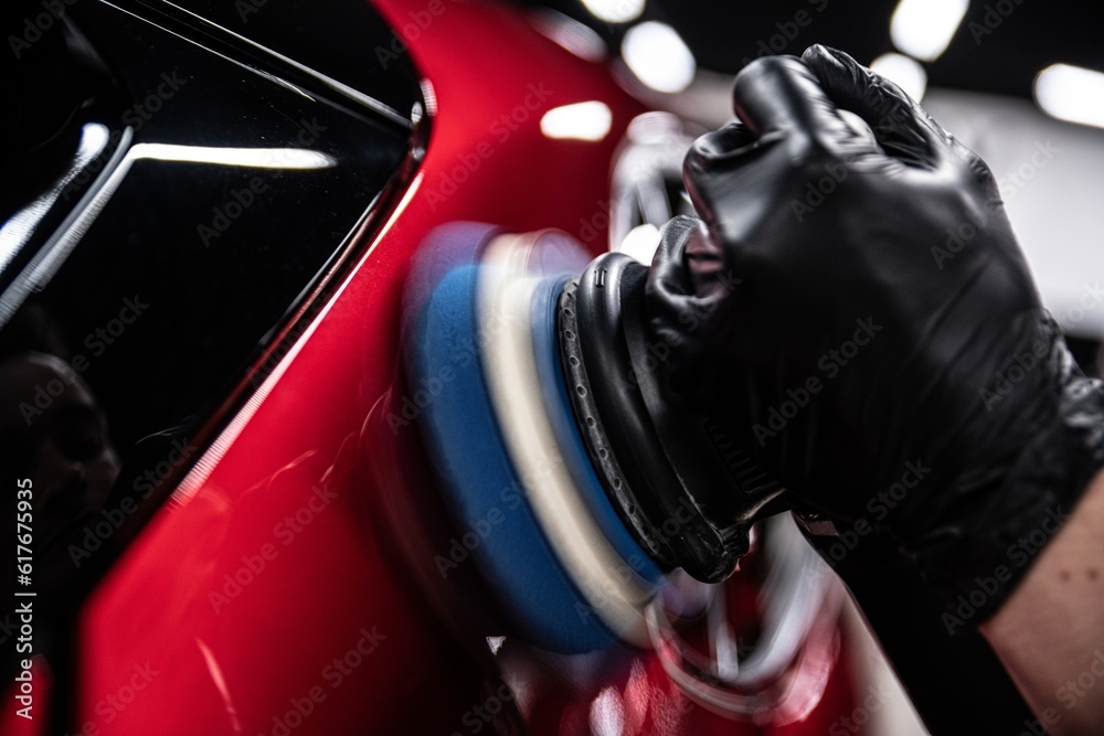 Electric machine paint correction in a car detailing studio is a meticulous process. It involves removing scratches and swirls, restoring the vehicle's shine, and enhancing paint depth.