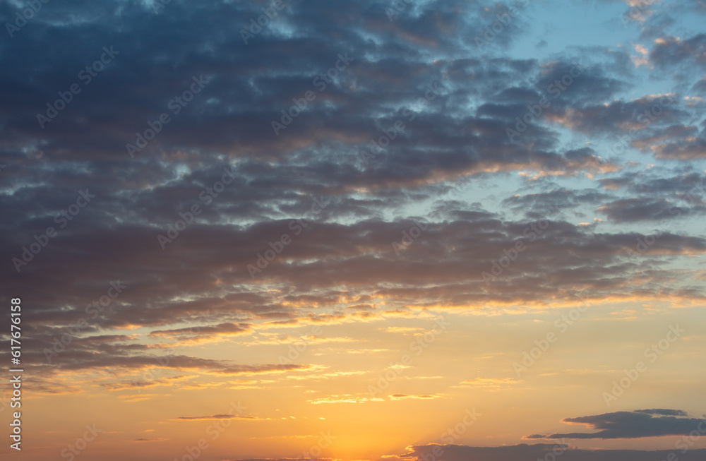 Colorful sky with clouds at sunset background