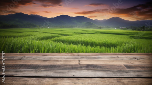Empty wooden board with rice field , mountain and twilight sky background