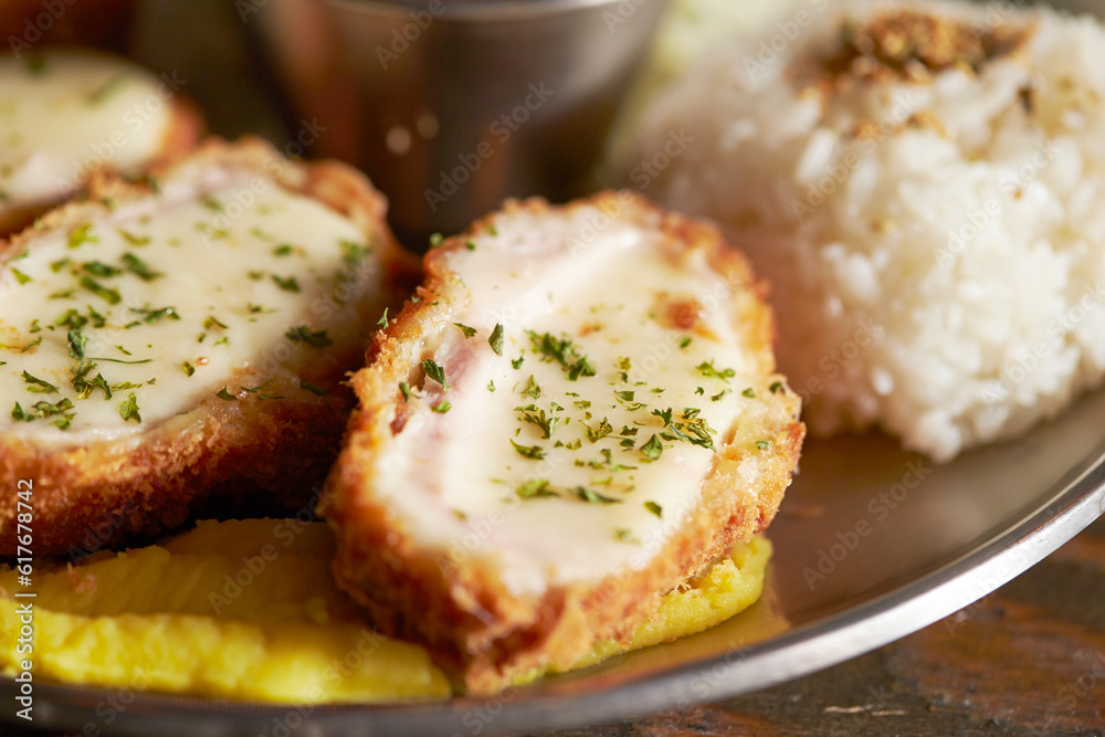 Cheese pork cutlet on a plate Cheese pork cutlet on a plate